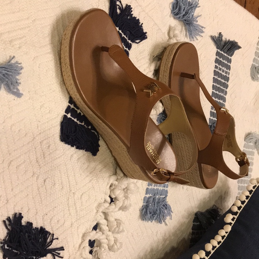 Used Michael Kors mid brown leather sandal .
